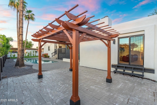 908 W Pershing Ave, Phoenix, AZ 85029 - patio terrace at dusk with a pergola, a patio, and entry steps