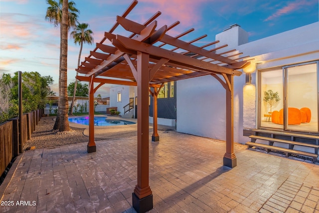 908 W Pershing Ave, Phoenix, AZ 85029 - patio terrace at dusk with entry steps, a pergola, a patio area, and a fenced backyard