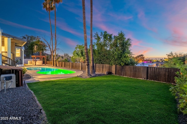 908 W Pershing Ave, Phoenix, AZ 85029 - yard at dusk with a fenced backyard