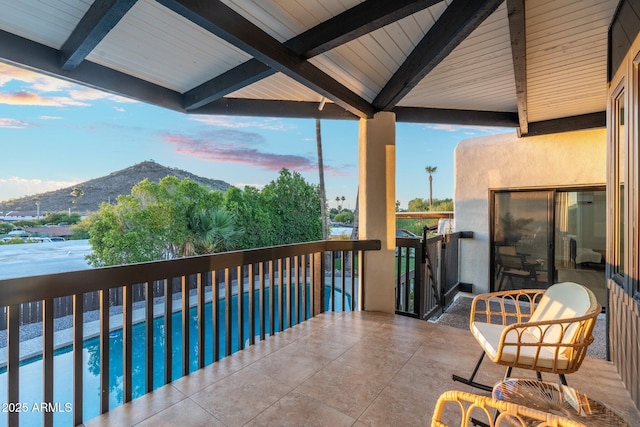 908 W Pershing Ave, Phoenix, AZ 85029 - balcony at dusk featuring a mountain view
