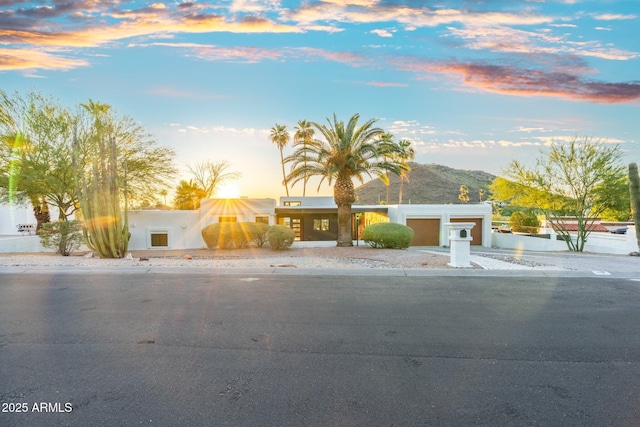 908 W Pershing Ave, Phoenix, AZ 85029 - view of front facade featuring driveway, stucco siding, and a garage