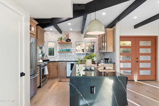 908 W Pershing Ave, Phoenix, AZ 85029 - kitchen with stainless steel appliances, beamed ceiling, light wood finished floors, decorative backsplash, and recessed lighting