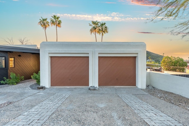 908 W Pershing Ave, Phoenix, AZ 85029 - garage at dusk with driveway