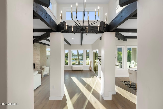 908 W Pershing Ave, Phoenix, AZ 85029 - foyer entrance featuring a chandelier, wood finished floors, beam ceiling, a high ceiling, and recessed lighting