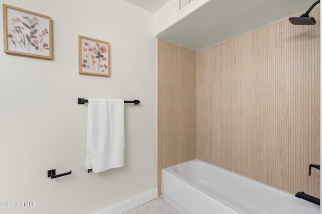 908 W Pershing Ave, Phoenix, AZ 85029 - full bathroom featuring baseboards and washtub / shower combination