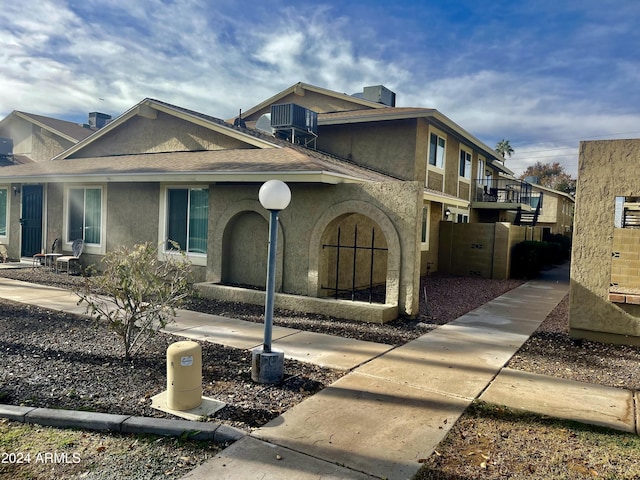 view of front of property featuring central AC unit