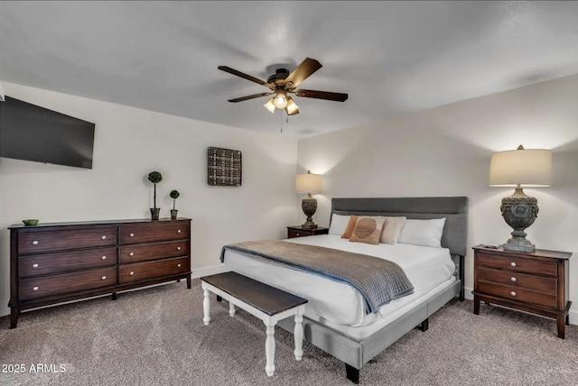 bedroom featuring ceiling fan and light colored carpet