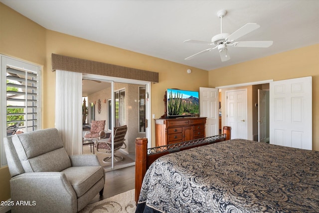 15225 E Golden Eagle Blvd, Fountain Hills, AZ 85268 - bedroom with access to outside, a ceiling fan, and wood finished floors