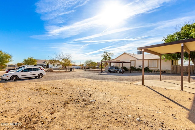 view of yard with a carport