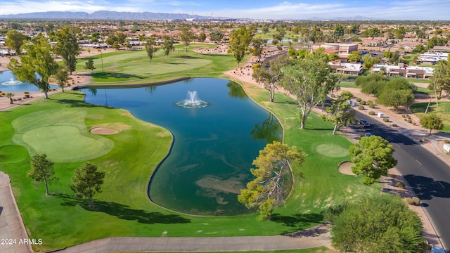 bird's eye view with a water and mountain view