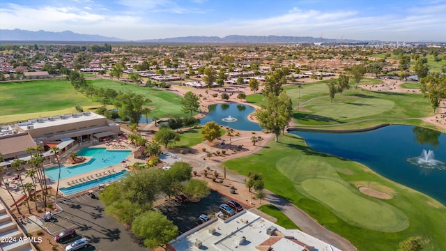 bird's eye view with a water and mountain view