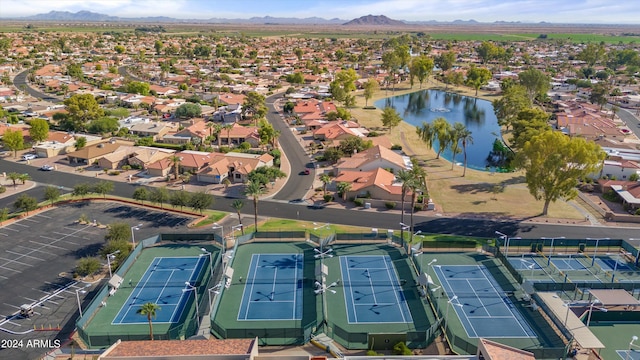 bird's eye view with a water and mountain view