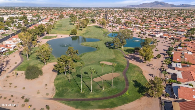 aerial view featuring a water and mountain view