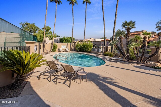 view of swimming pool featuring a patio