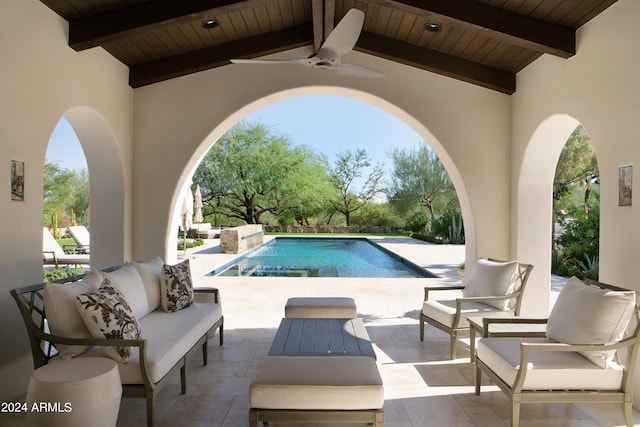 view of swimming pool featuring an outdoor hangout area, a patio area, and ceiling fan