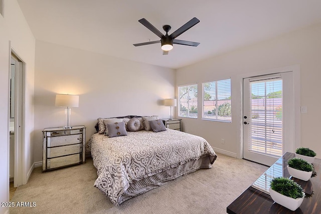 11333 N 92nd St Unit 1118, Scottsdale, AZ 85260 - carpeted bedroom featuring access to outside and a ceiling fan