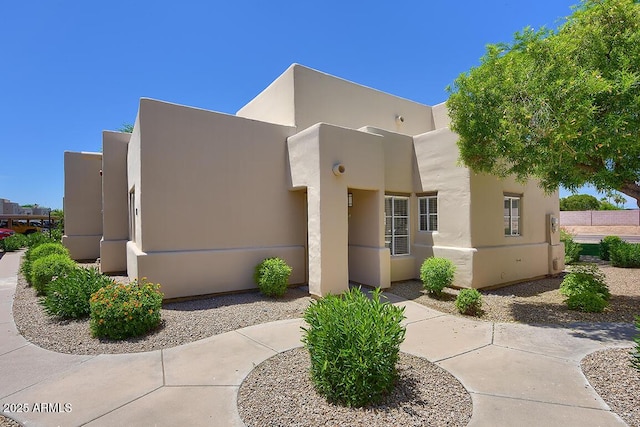11333 N 92nd St Unit 1118, Scottsdale, AZ 85260 - view of front of property featuring stucco siding