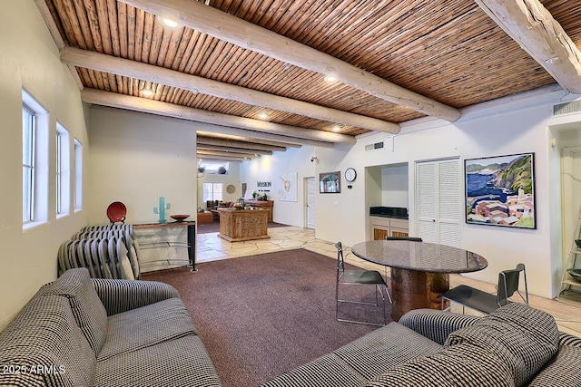 11333 N 92nd St Unit 1118, Scottsdale, AZ 85260 - living area with a wooden ceiling with exposed beams and healthy amount of natural light