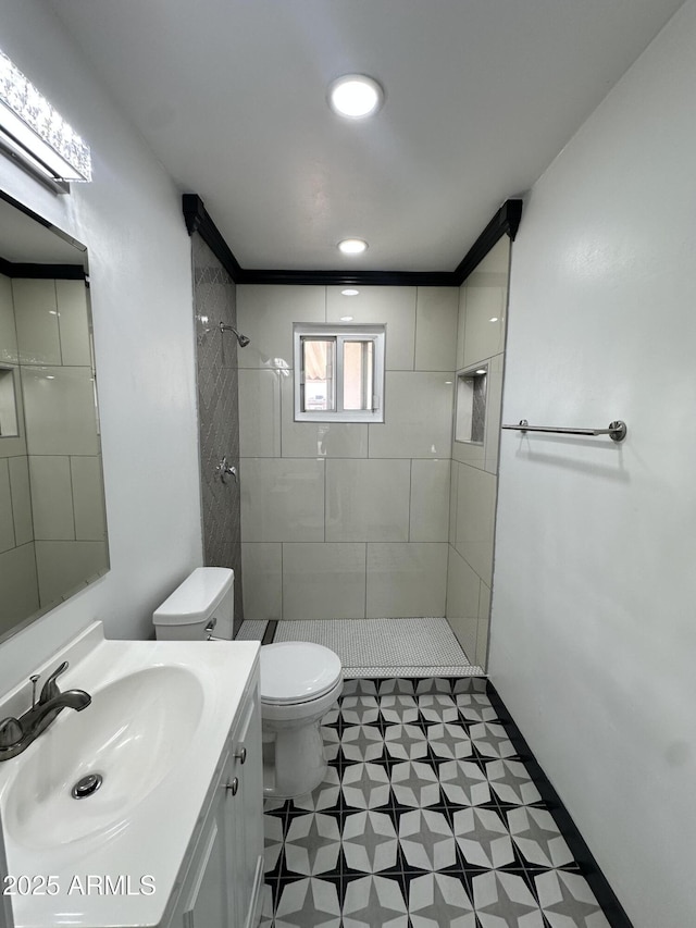 1214 E Henry St, Tempe, AZ 85288 - bathroom with tile patterned floors, toilet, a tile shower, and vanity