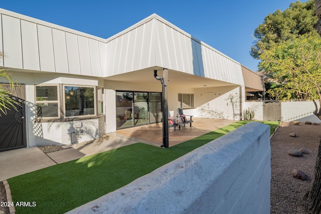 view of front facade with a patio area