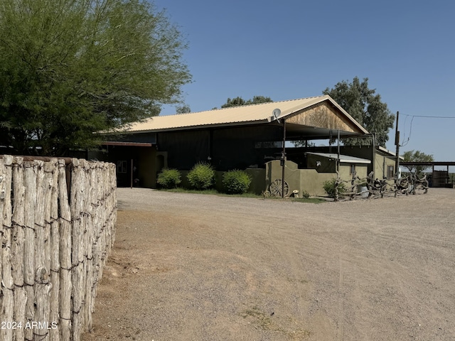 exterior space featuring metal roof