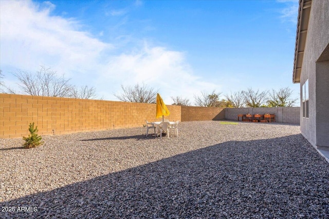 view of yard with a patio area