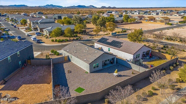 drone / aerial view featuring a mountain view