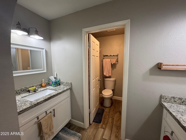 8520 W Palm Ln Unit 1054, Phoenix, AZ 85037 - bathroom with vanity and wood finished floors