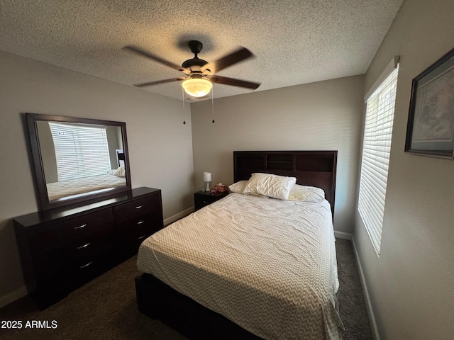 8520 W Palm Ln Unit 1054, Phoenix, AZ 85037 - bedroom featuring dark colored carpet, a textured ceiling, and ceiling fan