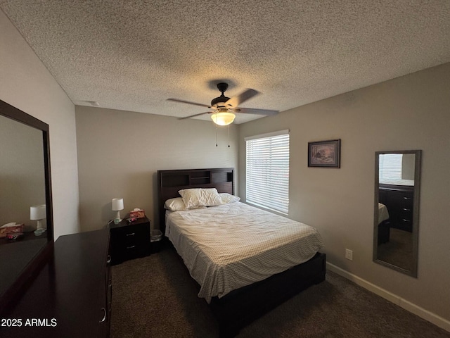 8520 W Palm Ln Unit 1054, Phoenix, AZ 85037 - bedroom with dark colored carpet, a ceiling fan, and a textured ceiling