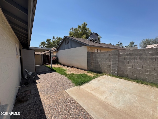 8520 W Palm Ln Unit 1054, Phoenix, AZ 85037 - view of yard featuring a patio area