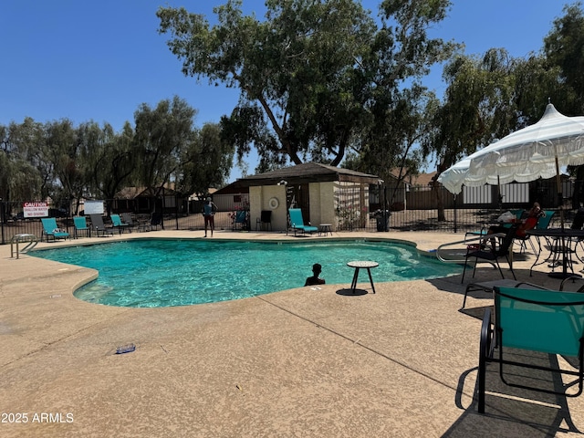 8520 W Palm Ln Unit 1054, Phoenix, AZ 85037 - community pool featuring a patio area