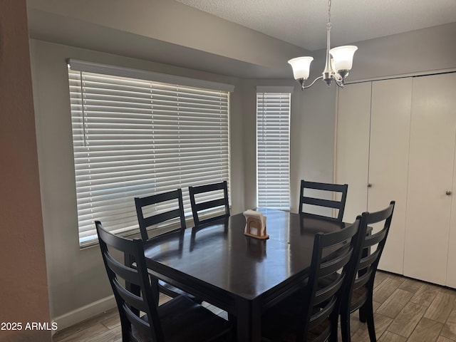 8520 W Palm Ln Unit 1054, Phoenix, AZ 85037 - dining room with wood finished floors and a chandelier