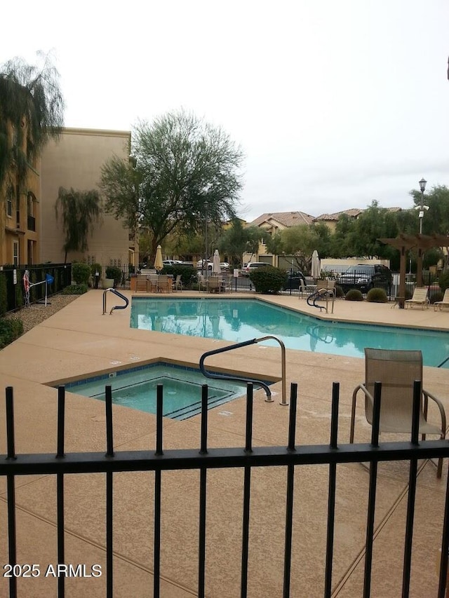 14575 W Mountain View Blvd Unit 711, Surprise, AZ 85374 - community pool with a patio area