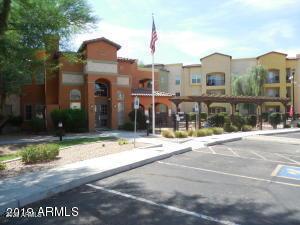 14575 W Mountain View Blvd Unit 711, Surprise, AZ 85374 - view of property with uncovered parking