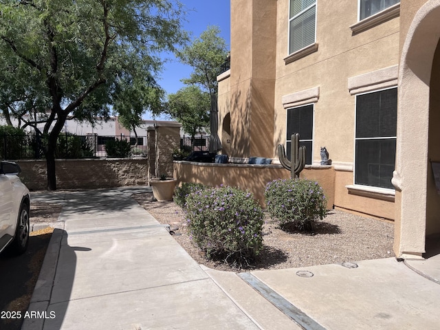 14575 W Mountain View Blvd Unit 711, Surprise, AZ 85374 - view of patio featuring fence