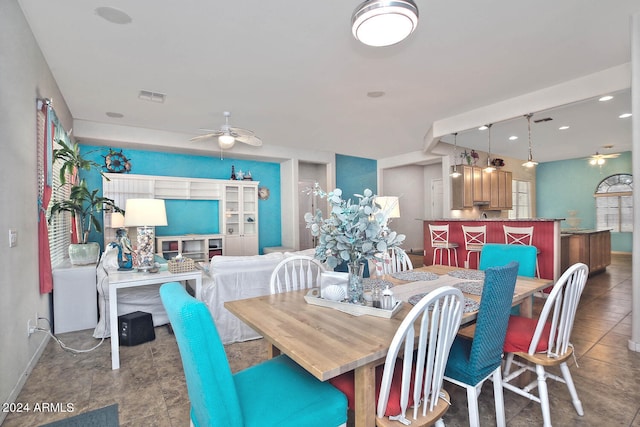 dining room with ceiling fan