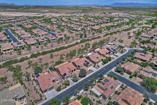 birds eye view of property featuring a mountain view