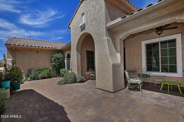 view of patio with ceiling fan