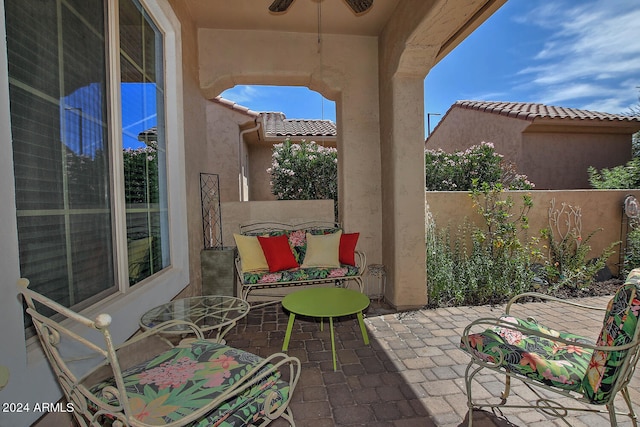 view of patio with ceiling fan