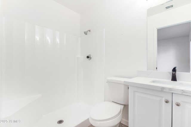 full bath featuring visible vents, vanity, toilet, and walk in shower