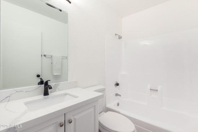 full bath with shower / bathing tub combination, vanity, and toilet