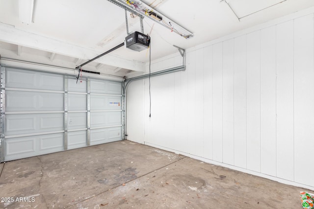 garage featuring a garage door opener