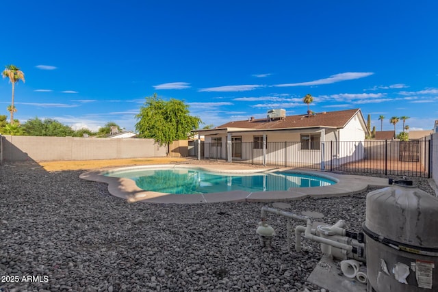 view of pool featuring a fenced in pool, a fenced backyard, and a patio