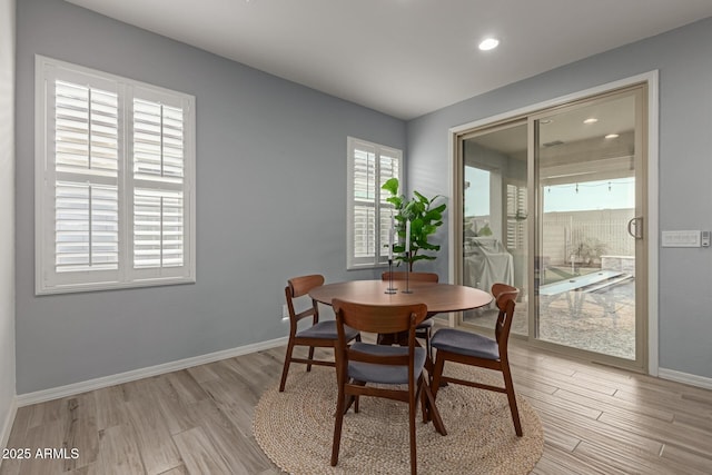 dining room featuring light hardwood / wood-style floors