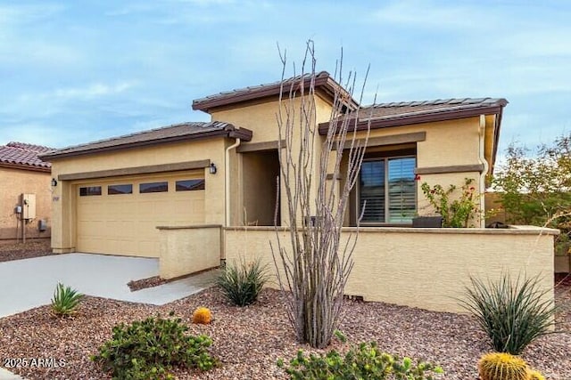 prairie-style home with a garage