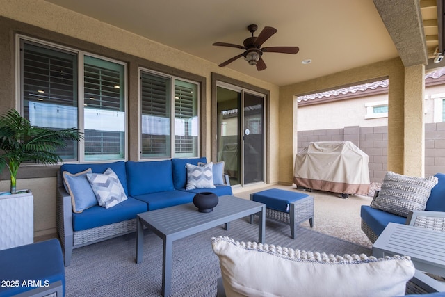 view of patio / terrace featuring outdoor lounge area, a grill, and ceiling fan