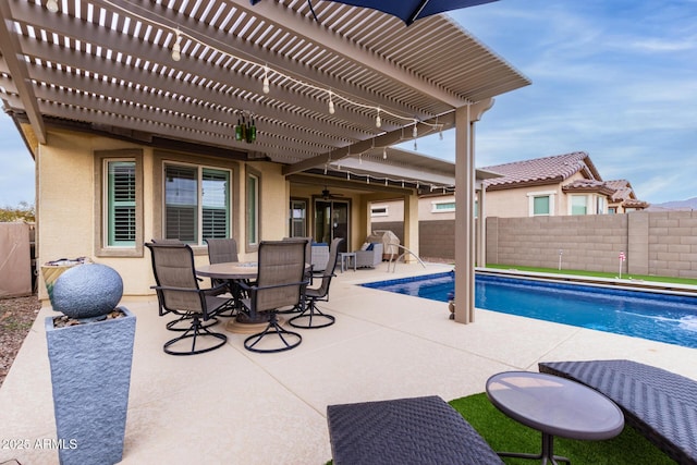 view of swimming pool with a pergola, a patio, and ceiling fan