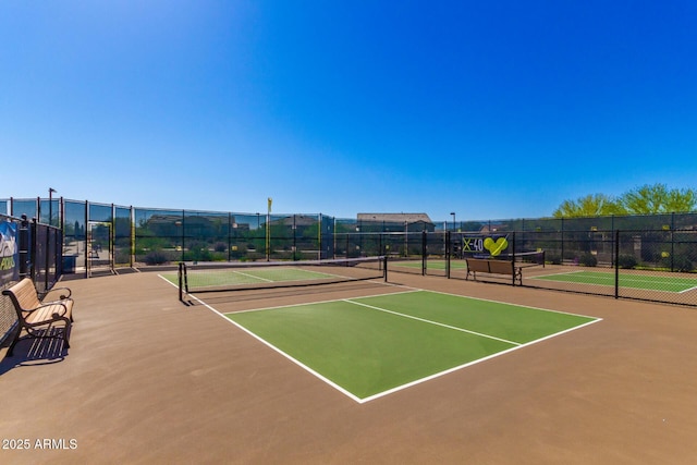 view of tennis court with basketball court