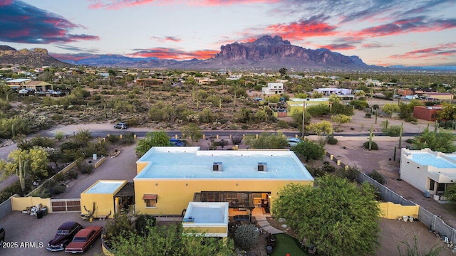 birds eye view of property featuring a mountain view